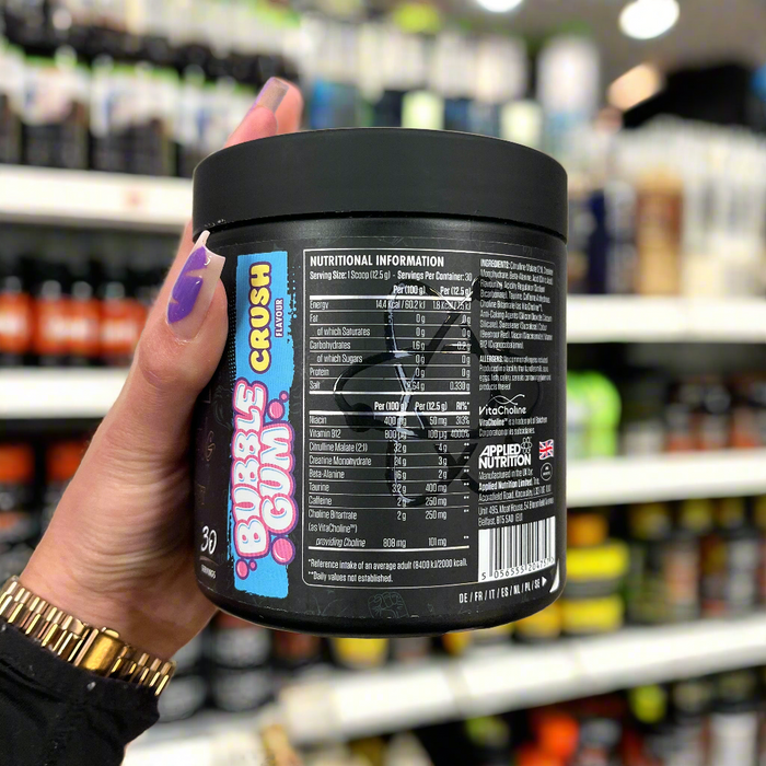 Close-up of (Applied Nutrition ABE Ultimate Preworkout 315g) held up inside My Supplement Shop, clearly showing Nutritional Values on the packaging in a Sports Nutrition setting.